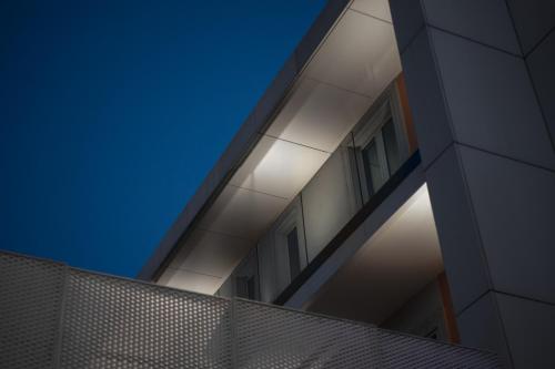 an external view of a building at night at Hotel Testani Frosinone in Frosinone