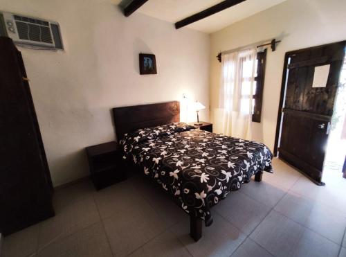 Postel nebo postele na pokoji v ubytování Finca Quinta Los Cedros