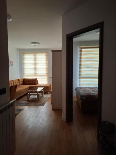 Ένα ή περισσότερα κρεβάτια σε δωμάτιο στο Comfort suite Bulevar