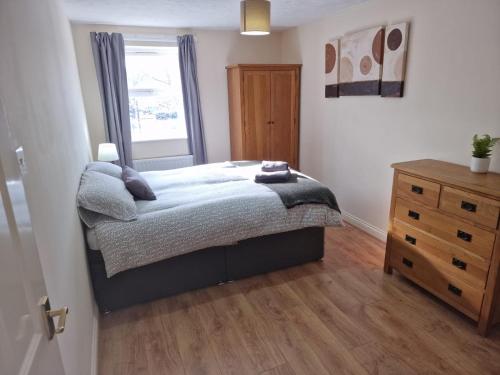 En eller flere senge i et værelse på Beaumont Court