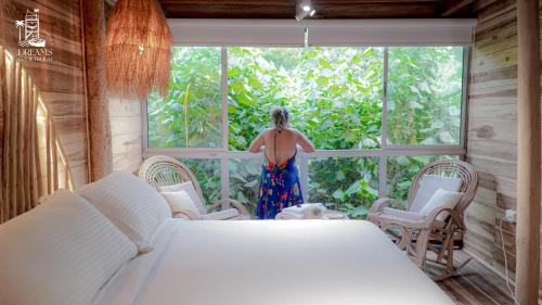 Ένα ή περισσότερα κρεβάτια σε δωμάτιο στο Habitacion Luxury Origen en Playa Mendihuaca, a 10 Min del Parque Tayrona