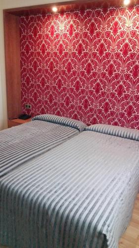 Katil atau katil-katil dalam bilik di Hotel Confort BRASEROS