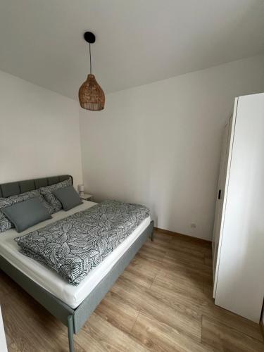 Ένα ή περισσότερα κρεβάτια σε δωμάτιο στο Apartament Popiel