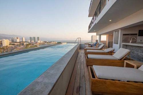 Πισίνα στο ή κοντά στο Pool with ocean view, gym - grupoxingo