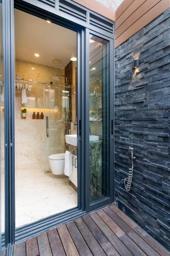 a glass door leading to a bathroom with a shower at ARIA Beach, Ukulhas in Ukulhas