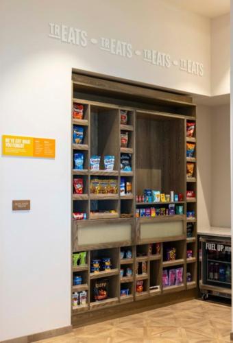 a store door with a shelf with food items at Hampton Inn & Suites Maui North Shore in Kahului