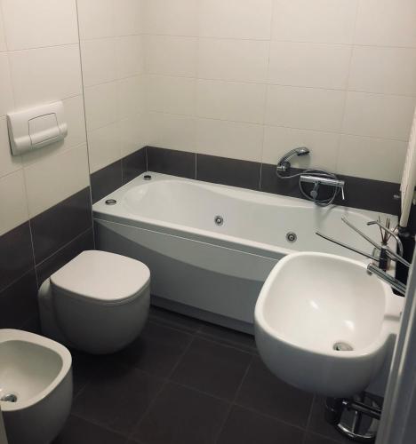 Koupelna v ubytování Stanza privata con bagno su appartamento condiviso