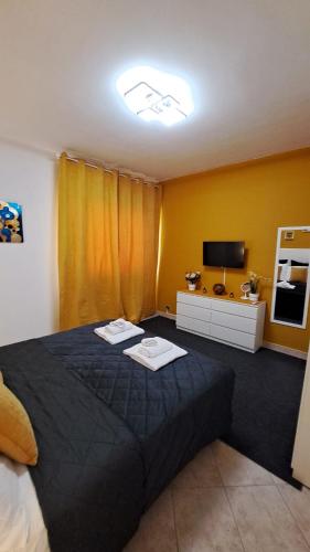 Ένα ή περισσότερα κρεβάτια σε δωμάτιο στο Deluxe Room a Tor Vergata Roma