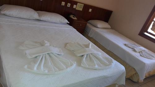 En eller flere senge i et værelse på Hotel 47 Icmeler