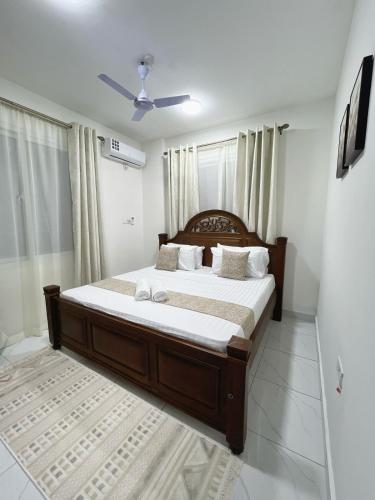 Katil atau katil-katil dalam bilik di Harmony Apartments