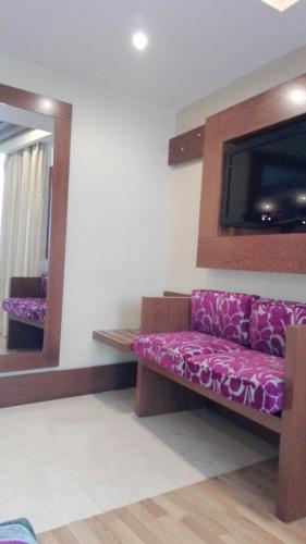Katil atau katil-katil dalam bilik di Hotel Confort BRASEROS
