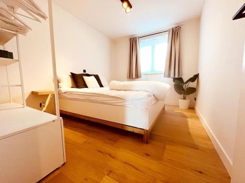 Ένα ή περισσότερα κρεβάτια σε δωμάτιο στο Apartment in Wenduine near Zeedijk Beach