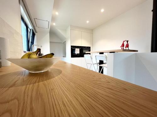 a bowl of bananas sitting on top of a kitchen counter at Villa in Wenduine near the Beach in Wenduine