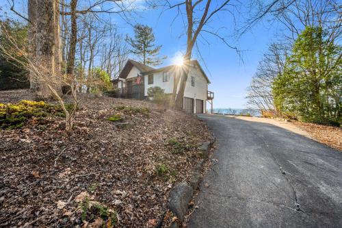 a house on the side of a road at Sunset Peaks by Carolina Mornings in Asheville