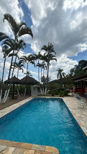 Kolam renang di atau dekat dengan Sítio Pousada Sol e Lua