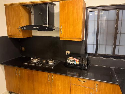 Η κουζίνα ή μικρή κουζίνα στο AQZ Apartments