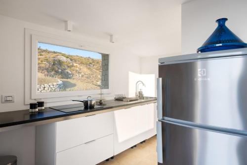 Η κουζίνα ή μικρή κουζίνα στο Villa Erakle a Luxury villa with amazing sunset view