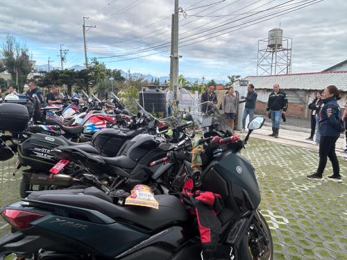a row of motorcycles parked on a street at Guoxiang B&B in Taitung City