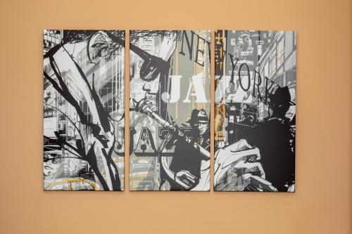 a group of four pictures hanging on a wall at The Jazz Club Downtown Sandusky in Sandusky