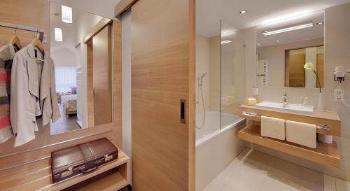 Koupelna v ubytování Hotel Holl
