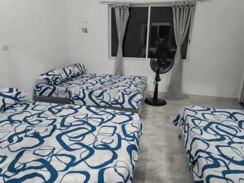 Ένα ή περισσότερα κρεβάτια σε δωμάτιο στο Casa Quinta Las Marías