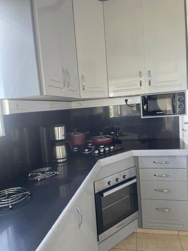 Una cocina o zona de cocina en Les orchidées