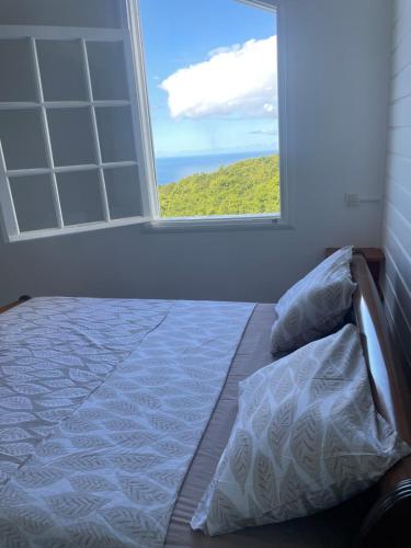 Cama o camas de una habitación en Les orchidées
