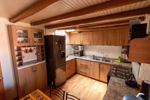 Η κουζίνα ή μικρή κουζίνα στο Casa Sutar 6