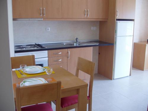 Cuisine ou kitchenette dans l'établissement Urban Flamingo Residence