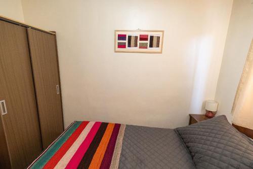 Una cama o camas en una habitación de Casa Sutar Las Higueras