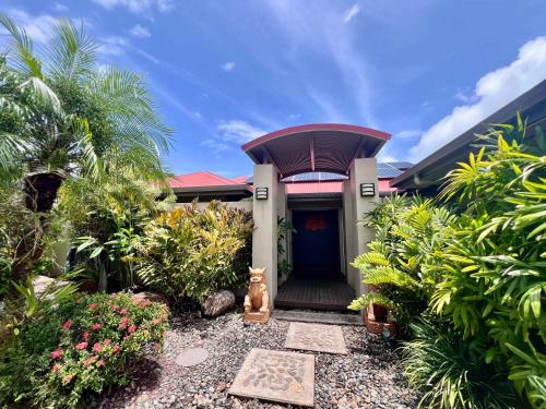 a front door of a house with plants at SpiritU at Mission Beach in Mission Beach