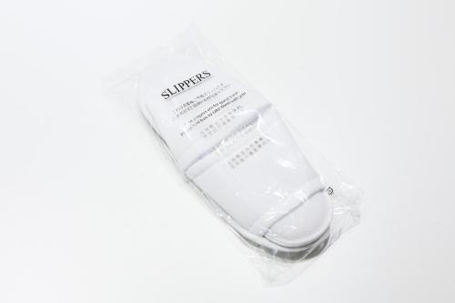 a plastic container filled with a bottle of sunscreen at Ashe Maison Matsu II in Osaka