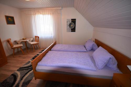 Voodi või voodid majutusasutuse Ferienhaus Angelika toas