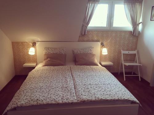 Ένα ή περισσότερα κρεβάτια σε δωμάτιο στο Hotel SAMARIN Črnomelj