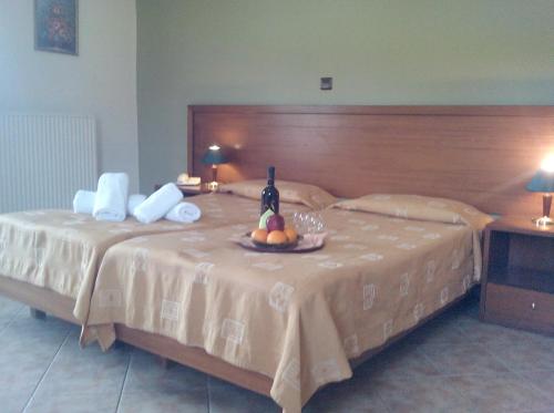 
Cama ou camas em um quarto em Agriani Hotel
