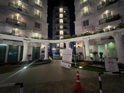 a view of a building at night at City Garden Olympus- 606 & 818 in Pattaya South