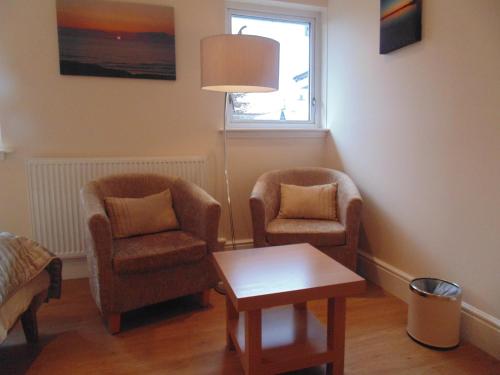 Posezení v ubytování Woodside Guest House