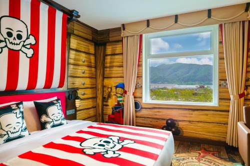 a bedroom with a pirate themed bed and a window at LEGOLAND Korea Resort Hotel in Chuncheon