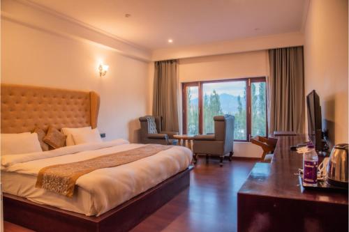 Postel nebo postele na pokoji v ubytování Hotel Zomday