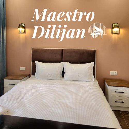 Postel nebo postele na pokoji v ubytování Maestro Dilijan