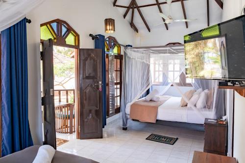 Postel nebo postele na pokoji v ubytování Serenity Beach Cabanas