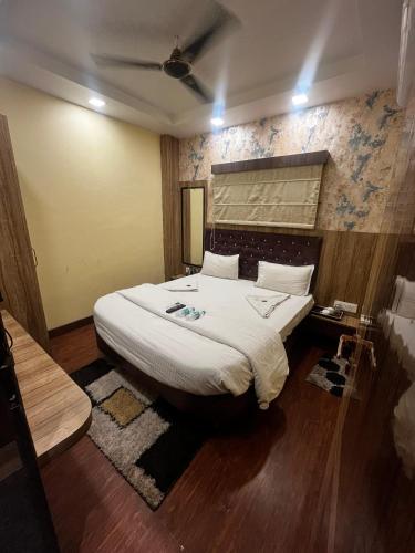 Postel nebo postele na pokoji v ubytování KS PAYING GUEST HOUSE