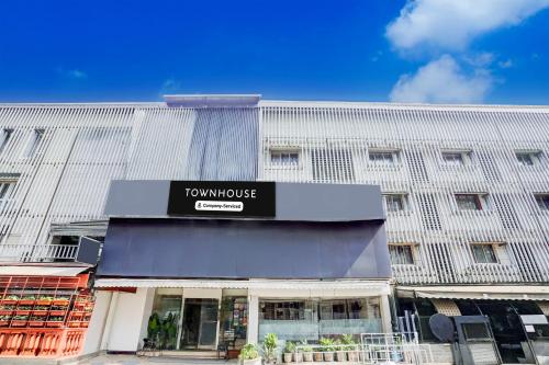 a building with a tumulus sign on the front of it at The Unicontinental in Mumbai