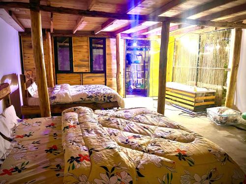 a bedroom with two beds in a room at Moivaro eco hostel in Arusha