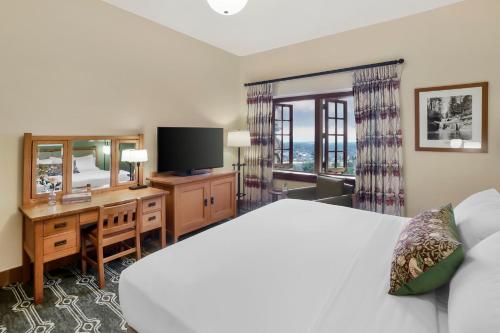 Ένα ή περισσότερα κρεβάτια σε δωμάτιο στο The Omni Grove Park Inn & Spa - Asheville