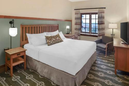 Ένα ή περισσότερα κρεβάτια σε δωμάτιο στο The Omni Grove Park Inn & Spa - Asheville