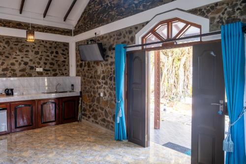 Kuchyň nebo kuchyňský kout v ubytování Serenity Beach Cabanas