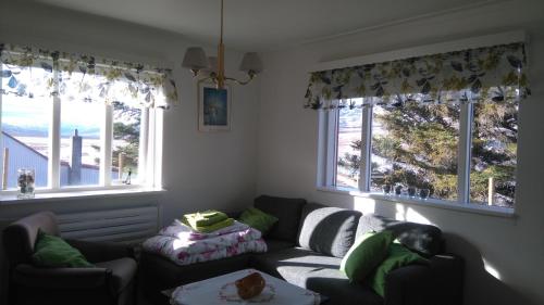 Un lugar para sentarse en Brúnalaug Guesthouse - Holiday Home