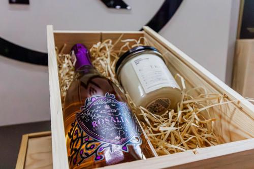 a bottle of wine sitting in a box at Park Hotel Bydgoszcz in Bydgoszcz