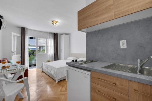 Posteľ alebo postele v izbe v ubytovaní Urban Studios